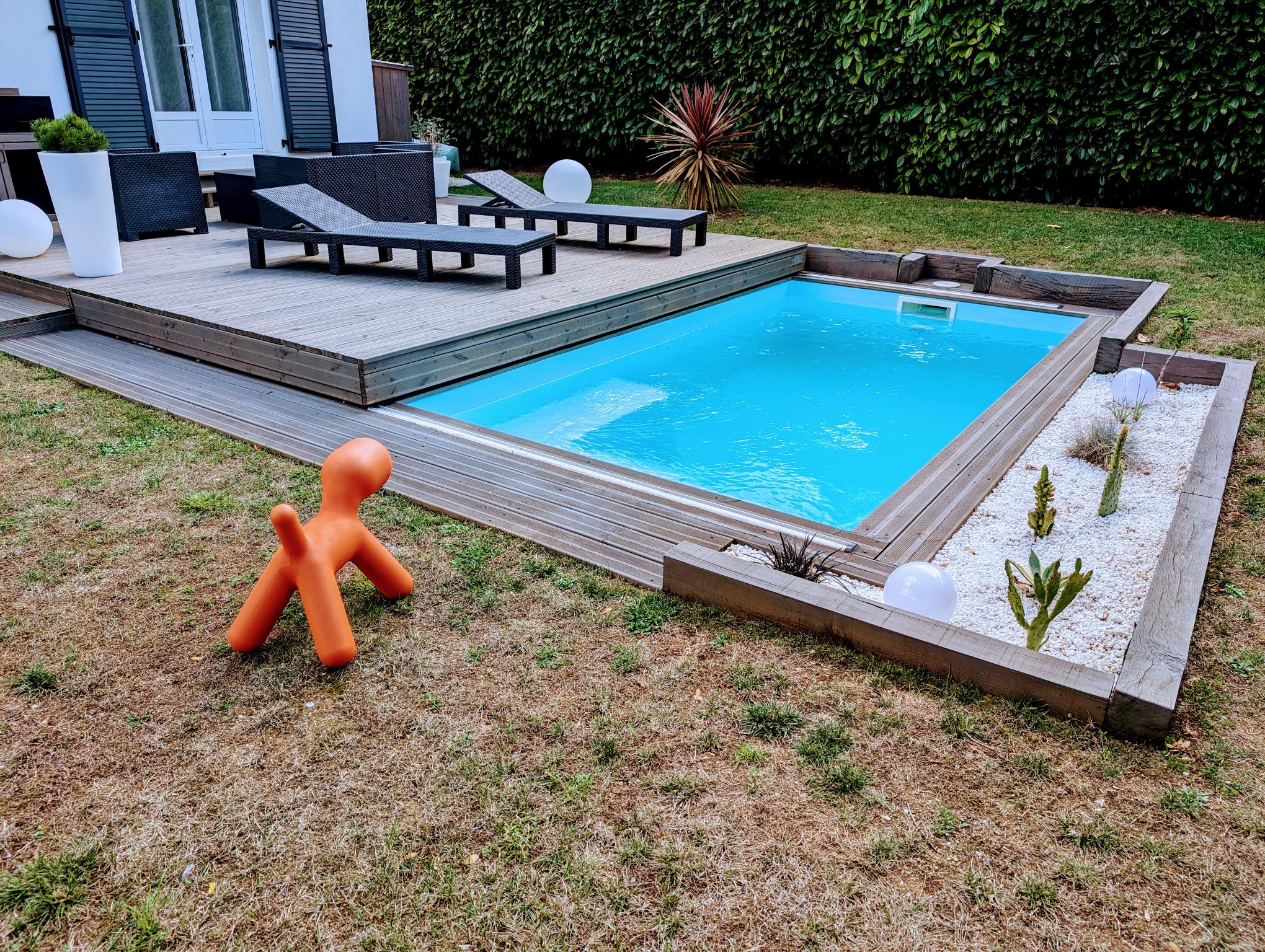 Terrasse mobile coulissante ouverte sur la piscine